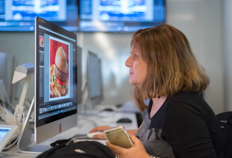 IRP member Lale Odekon working on a photograph in a lightroom workshop