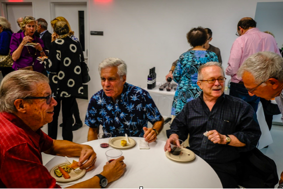 IRP members enjoy social time after a General Membership Meeting, 2018