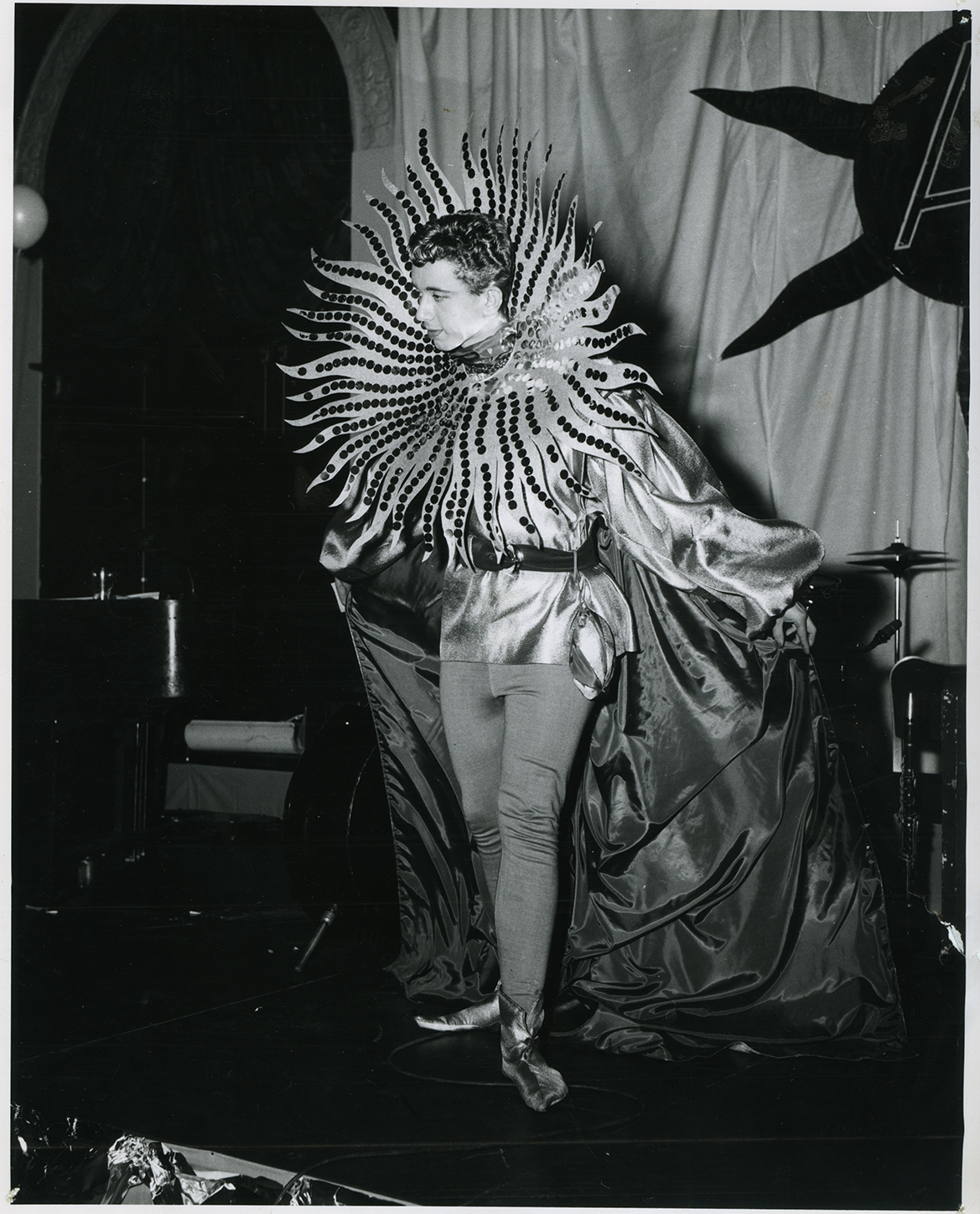 black and white photo of young adult in a costume