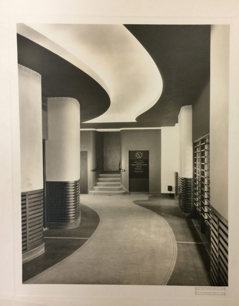 Black and white photo of an art deco hallway