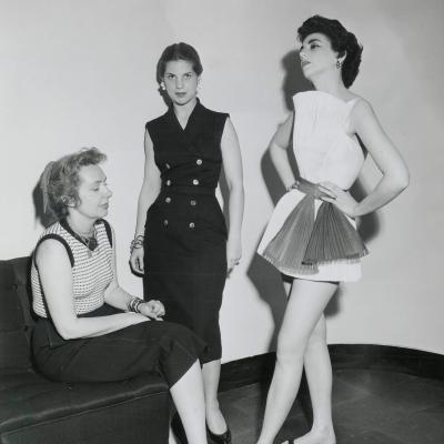 A black and white portrait of three women